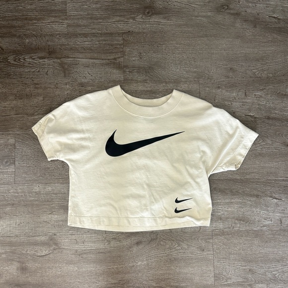 Nike Tops - Nike Off-White Cropped T-Shirt with Black Logo